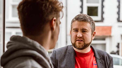 Mike speaking on the doorstep